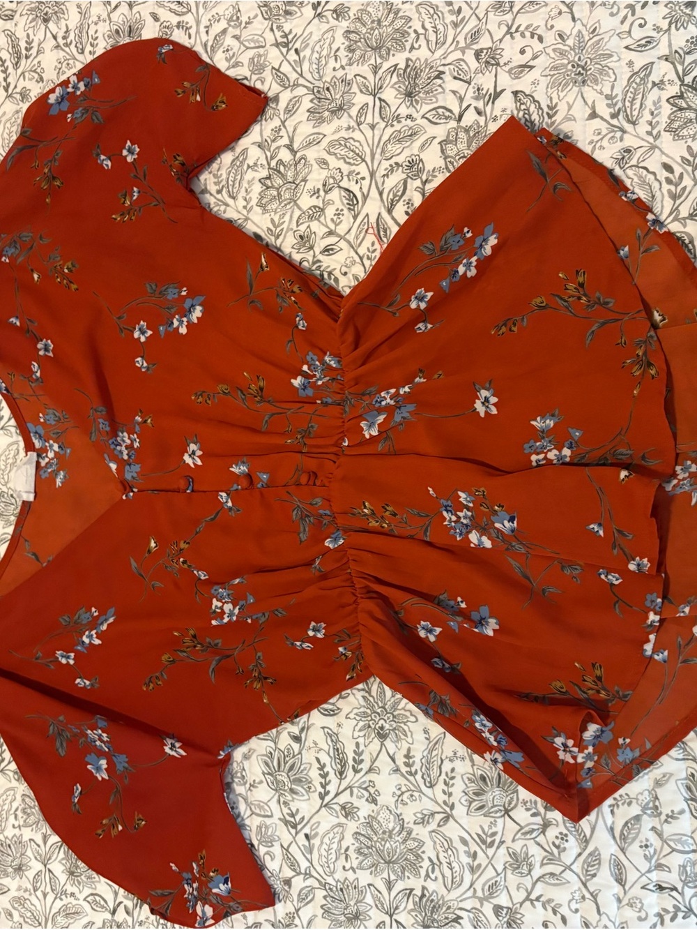Sienna Sky Rust Floral Ruffle Front Blouse